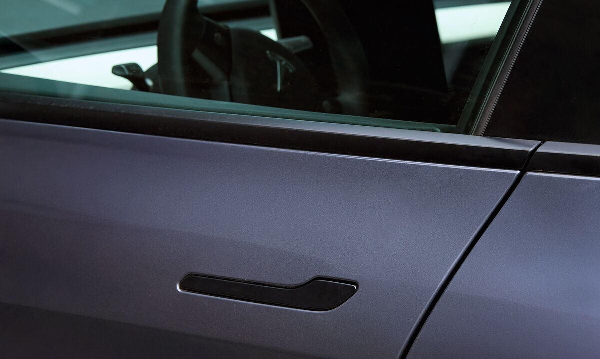 Illustrative photo for: US Auto Safety Regulator Receives Surge of Tesla Door