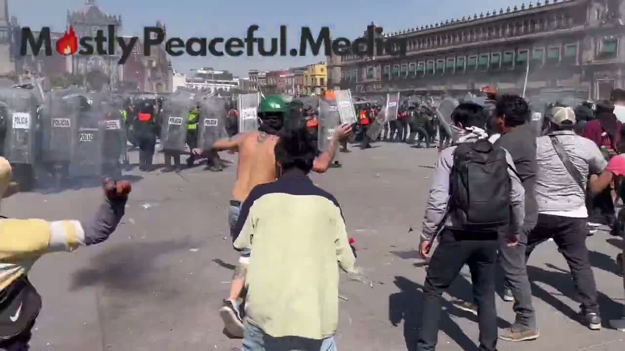 Illustrative photo for: Mexican riot police assault as protesters storm